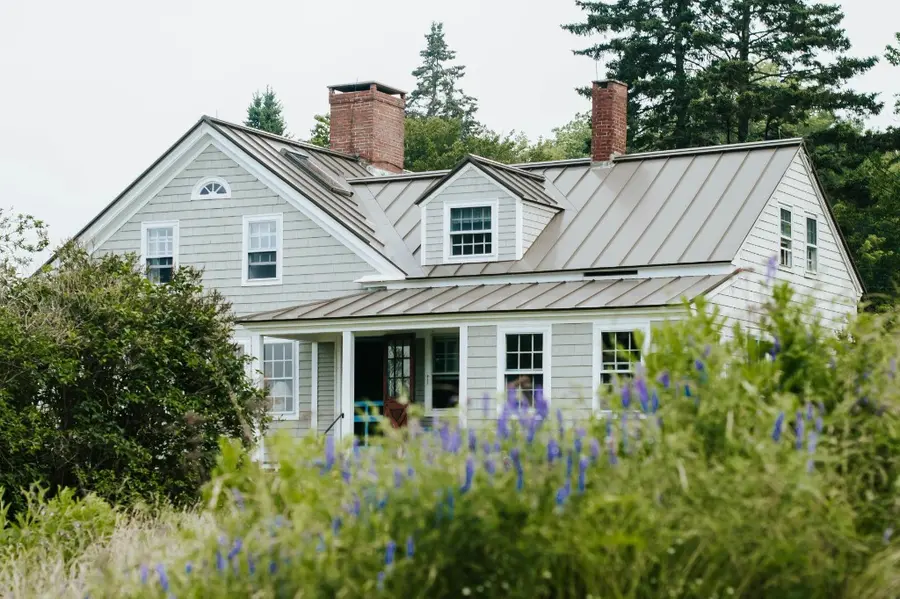 Roofing materials and styles commonly used in the UK, showcasing various designs and textures on residential buildings